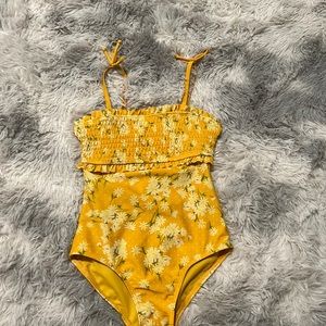 Girls small yellow flower swimsuit.